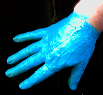 Our new UV Blue wax based body paint on a hand